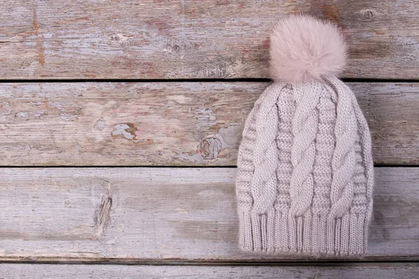 Beautiful knitted hat with fur pompom.
