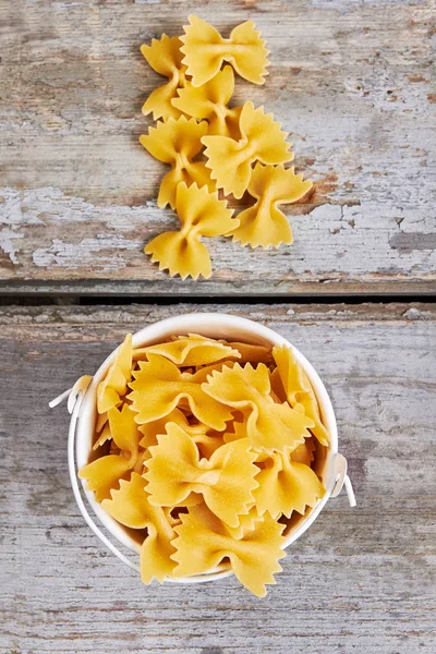 Pasta in a small bucket.