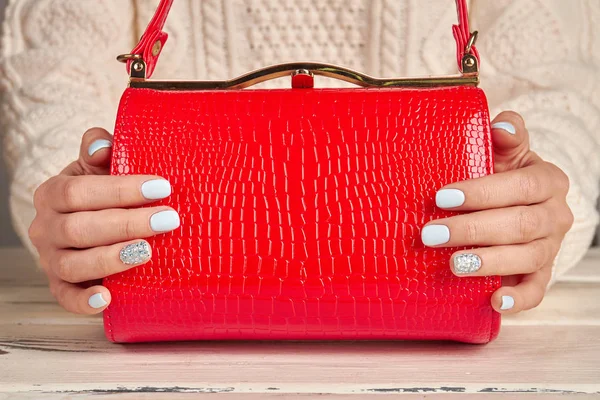 Trendy red female bag.