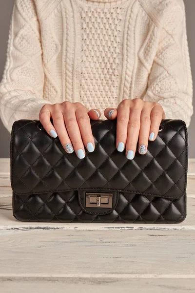Beautiful light blue manicure with rhinestones.