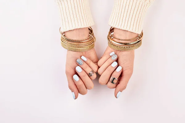 Female hands with beautiful accessories. — Stock Photo, Image