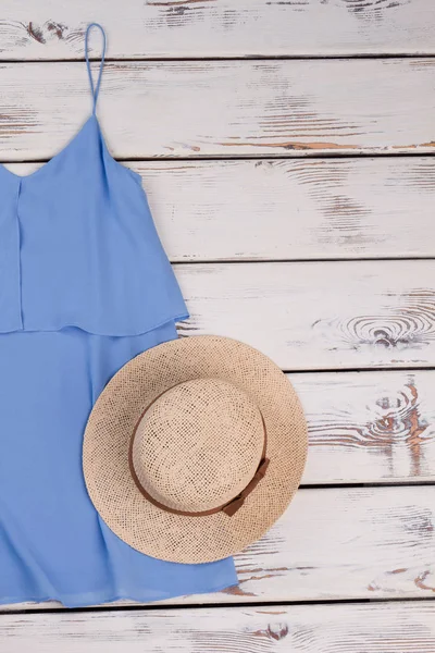 Smooth women blouse, woven hat.