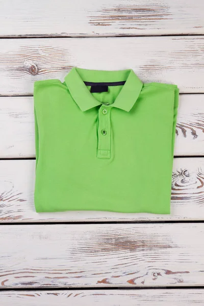 Folded men polo light green shirt. | Stock Images Page | Everypixel