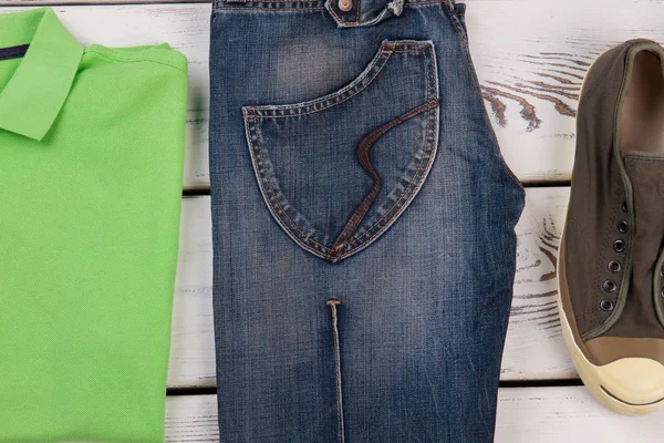 Fashion design jeans, shirt, sneakers.