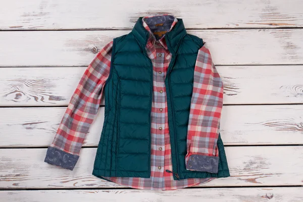 Quilted vest and flannel shirt