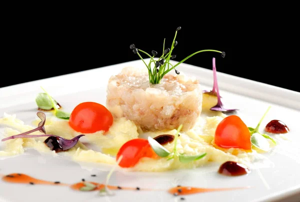 Elegant seabass tartare with potato — Stock Photo, Image