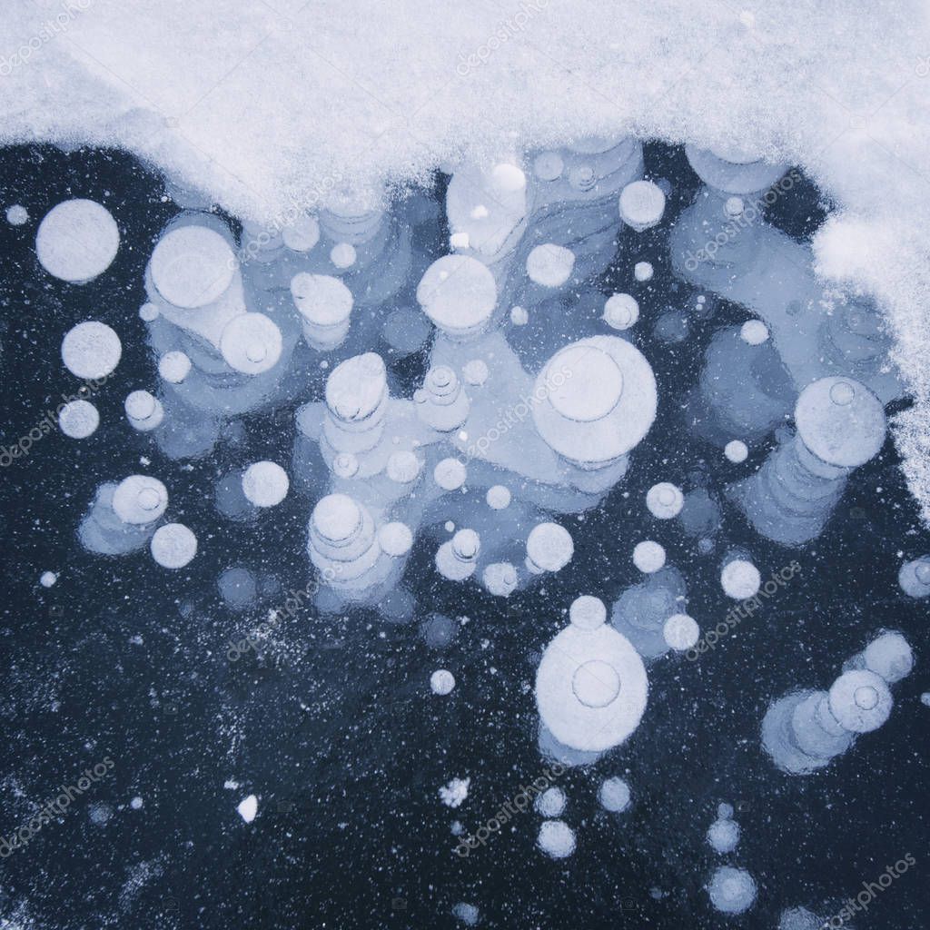 Air bubbles in ice of Baikal lake — Stock Photo © Ukususha 144156395