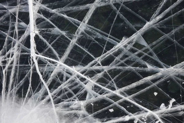 Rachaduras no gelo do lago Baikal. Textura de inverno — Fotografia de Stock