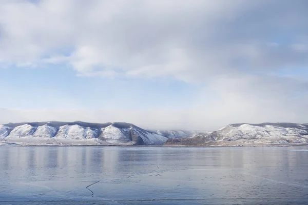 Lake Baikal ice. Mountains. Winter landscape — Stock Photo, Image