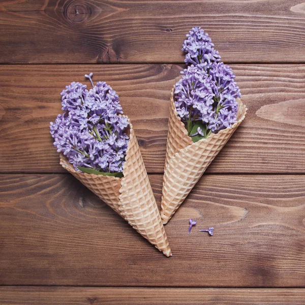 Waffle cones with lilac flowers