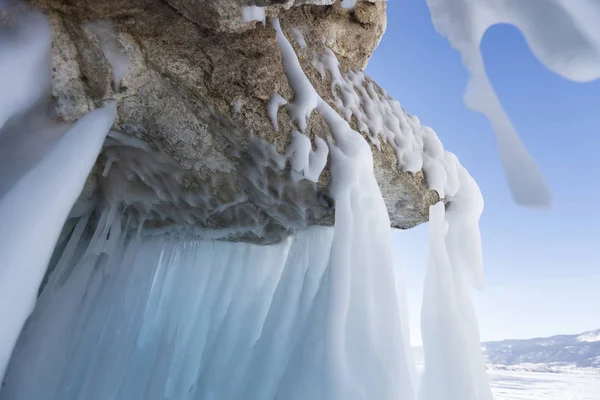 Icicles on stone, Lake Baikal. Winter — Stock Photo, Image