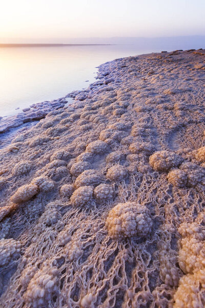 Salt on the shore. Dead Sea landscape. Jordan