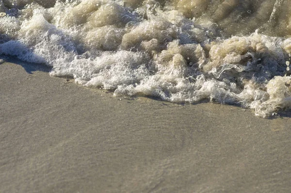 Ola de mar con espuma de cerca — Foto de Stock