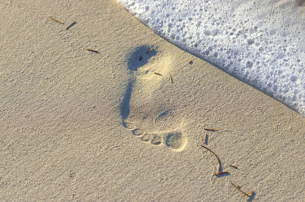 Konvexer Fußabdruck im Sand — Stockfoto