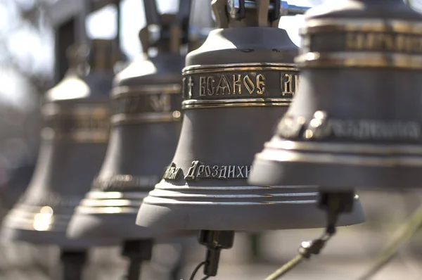 Church bells in the bell next to the church — Stock Photo, Image