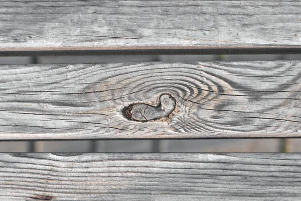 Tabule s uzly, svislá stará dřevěná deska — Stock fotografie