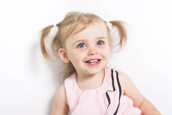 Portrait of a two year old girl isolated on white background — Stock Photo, Image