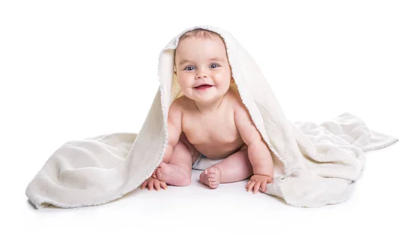 Baby under a towel. isolated on a white background — Stock Photo, Image