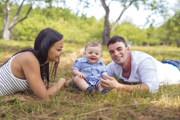 Happy Family Having fun with baby playing In The Park. — Stock Photo, Image