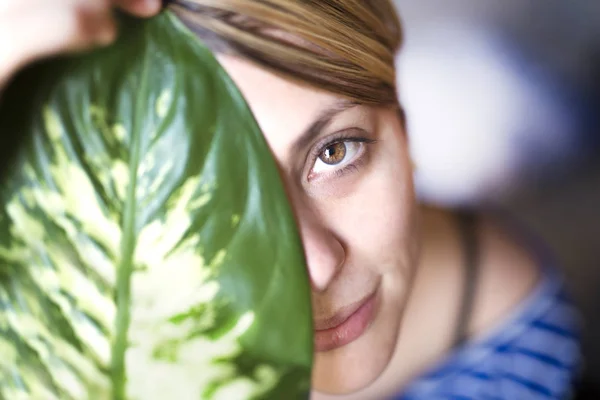 Skin care woman face with green leaf — Stock Photo, Image