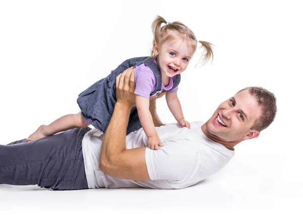 Vader en dochter lag op de grond met plezier — Stockfoto