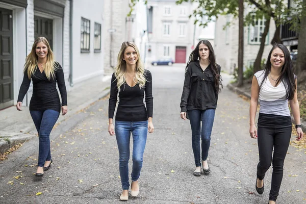 Four young good girl friend people in the city — Stock Photo, Image