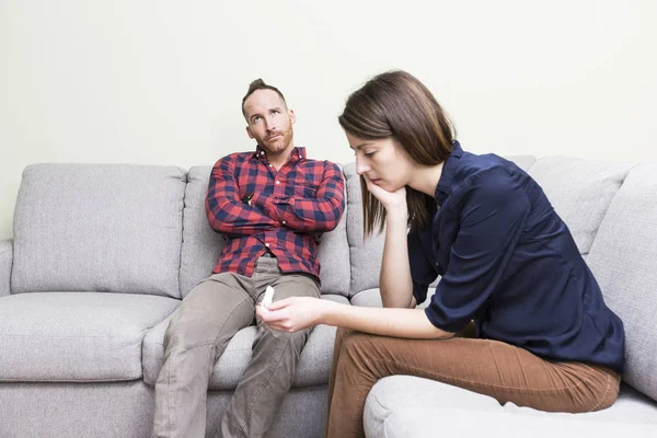Lovers couple scared after pregnancy test result — Stock Photo, Image
