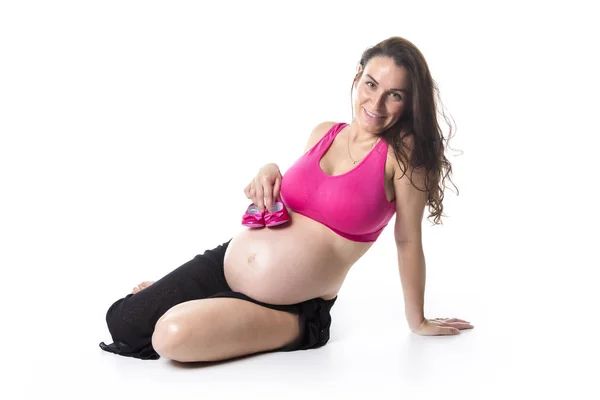 Mujer embarazada vientre sobre fondo blanco —  Fotos de Stock