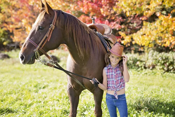 Autumn season young girl and horse — Stock Photo, Image