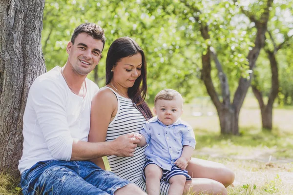 Happy Family Having fun with baby playing In The Park. — Stock Photo, Image