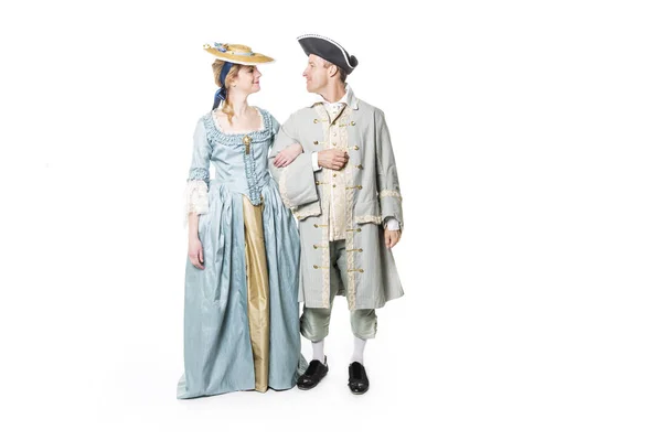 Smukt par i lang middelalderlig kjole isoleret på hvid - Stock-foto