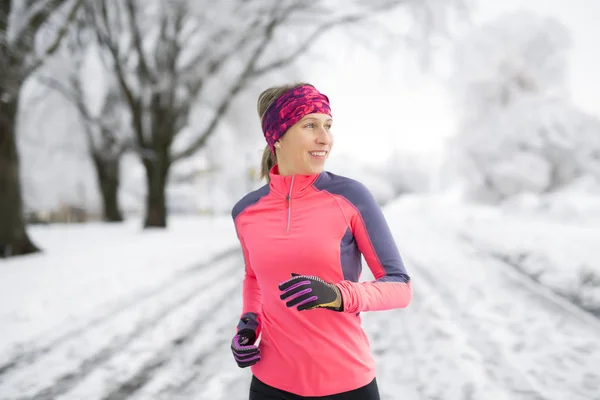 stock image Fitness running woman in winter season