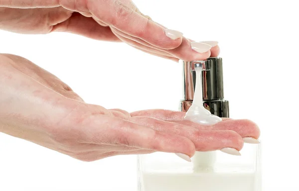 Hand soap with pumping lotion from bottle — Stock Photo, Image