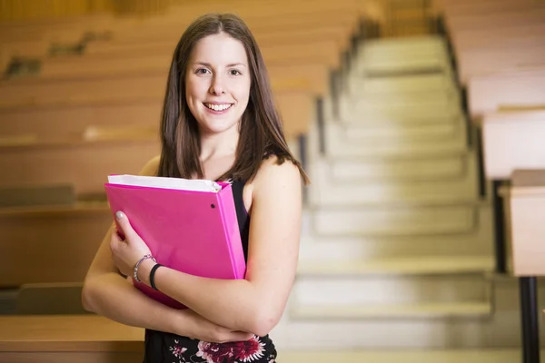 Shot of a woman college student studying on campus — Stock Photo, Image