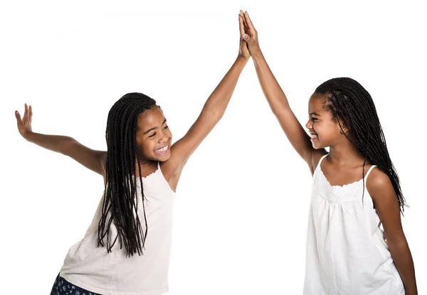 Two Adorable african twin girl on studio white background — Stock Photo, Image