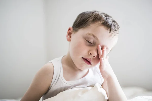 Young Boy on bed — Stock Photo, Image