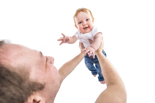 Mens hands hold the baby on a white background — Stock Photo, Image