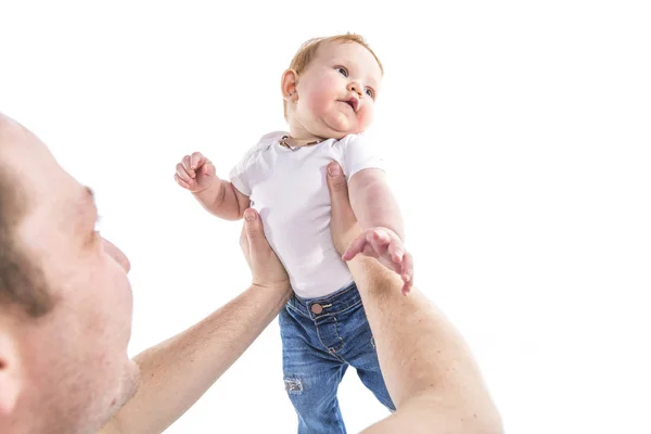 Mens hands hold the baby on a white background — Stock Photo, Image