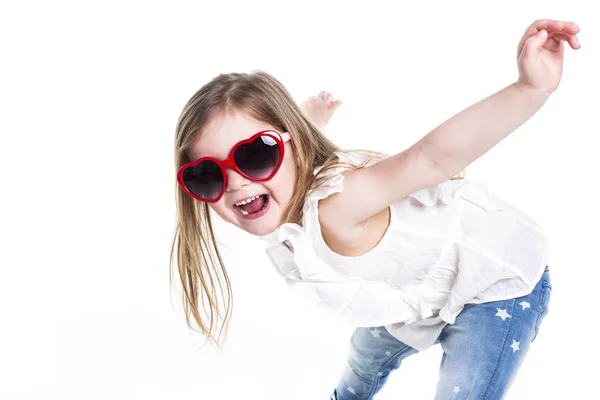 Little girl with love glasses on studio white background — Stock Photo, Image