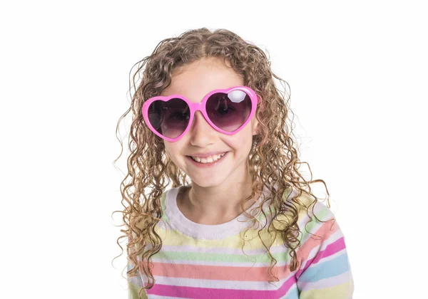 Portrait of happy, smiling, confident 9 years old girl with curly hair, isolated on white — Stock Photo, Image