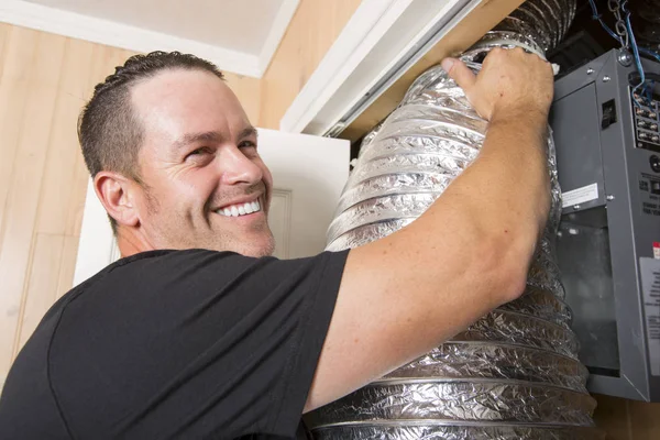 Ventilation cleaner man at work with tool — Stock Photo, Image