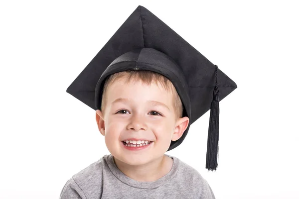 Adorable four years old child boy wearing a mortar board. — Stock Photo, Image