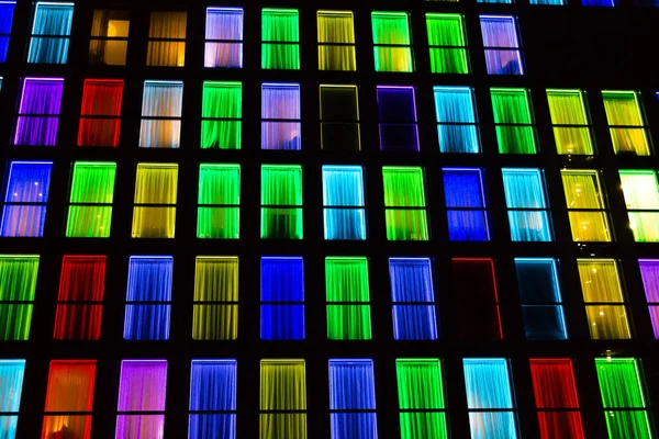 Colored windows texture. Neon light background