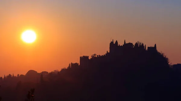 Castle silhouette at sundown