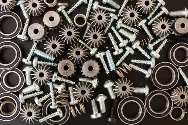 Tło Komponentami Mechanicznymi Przekładniami Zębatymi Sprężynami Śrubami Obiektami Przemysłowymi — Zdjęcie stockowe