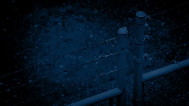 Wire Fence On Rainy Night — Stock Video