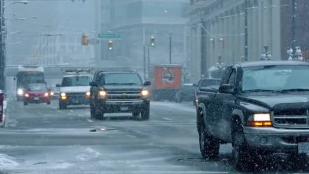 Cars Passing On City Road With Snow Falling. Vancouver, Canada, February 2017 — Stock Video