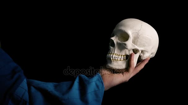 Skull Held Out - Théâtre Acting Concept 