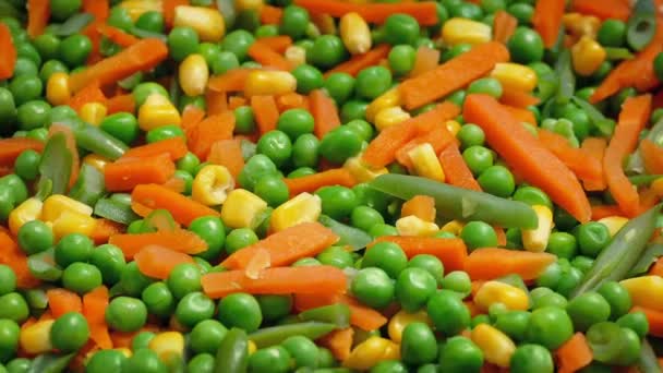 Peas And Carrots Mixture Closeup — Stock Video