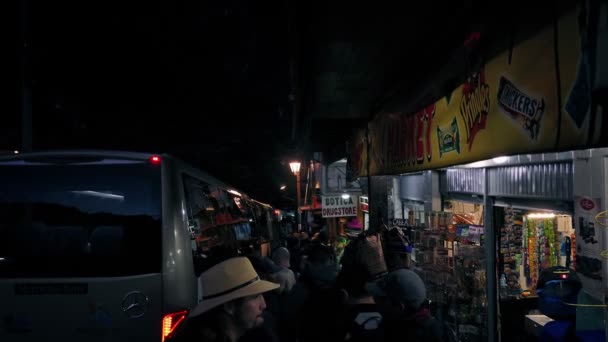 People Queueing For Coaches At Night In South America Town. Cusco, Peru, June 2017 — Stock Video